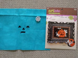 Artista Halloween kit. I'm using a bright blue from Garibaldi's Needleworks. Life's too short to stitch the entire black background! Blue will look very nice, methinks.